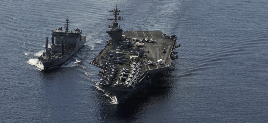 The Nimitz-class aircraft carrier USS Carl Vinson (CVN 70) and the Indian navy replenishment oiler INS Shakti (A57) conduct a refueling at sea exercise, April 13, 2012.