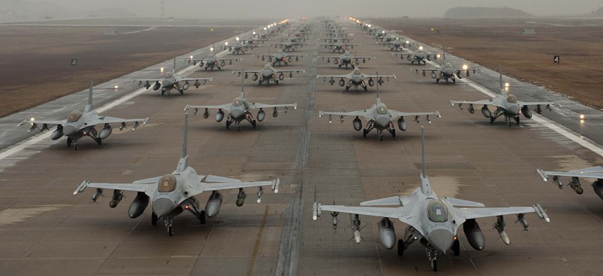 F-16 Fighting Falcons demonstrate an 'Elephant Walk' as they taxi down the flightline at Kunsan Air Base, South Korea, Dec. 14, 2012. 