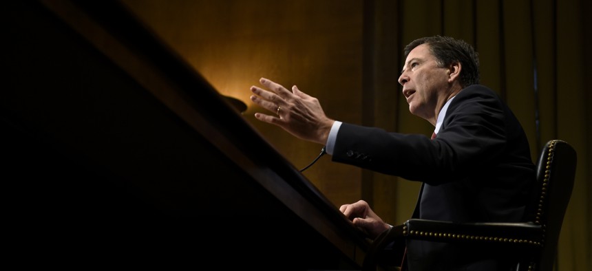 FBI Director James Comey testifies on Capitol Hill in Washington, Wednesday, Dec. 9, 2015, before the Senate Judiciary Committee.