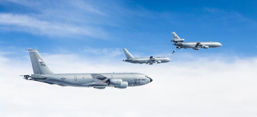 Boeing's KC-46A conducting tests of aircraft acceleration and vibration exposure while flying in receiver formation at various speeds and altitudes behind either the KC-10 Extender or the KC-135 Stratotanker, Oct. 19, 2015, over Owens Valle, Calif.