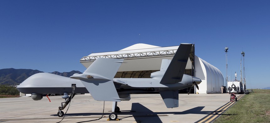 In this Sept. 24, 2014 file photo, a U.S. Customs and Border Patrol drone aircraft is prepped prior to it's flight at Ft. Huachuca in Sierra Vista, Ariz. 