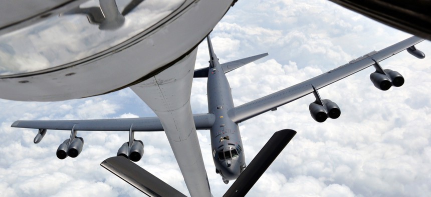 A B-52 Stratofortress approaches a KC-135 Stratotanker during an air refueling training exercise on May 12, 2014.
