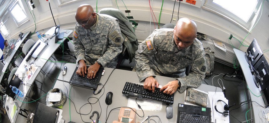 Soldiers from the 2nd Signal Brigade complete a mission in the Joint Cyber Control Center in Grafenwoehr, Germany, Feb. 23, 2011