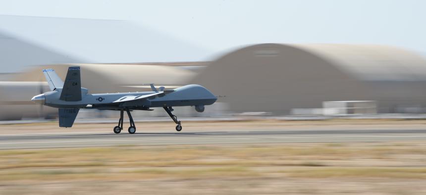 An MQ‐9 Reaper flies from the Southern California Logistics Airport in Victorville, Calif., July 30, 2014