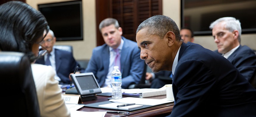 President Barack Obama listens to National Security Advisor Susan E. Rice during a National Security Council meeting to prep for the United Nations General Assembly, in the Situation Room of the White House, Sept. 19, 2014. 