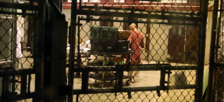 In this Feb. 2, 2016 photo, a detainee is seen in the communal area inside Camp 6 in the U.S. detention center at Guantanamo Bay, Cuba. 