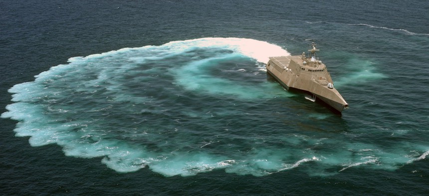 The littoral combat ship USS Independence (LCS 2) demonstrates its maneuvering capabilities in the Pacific Ocean off the coast of San Diego.