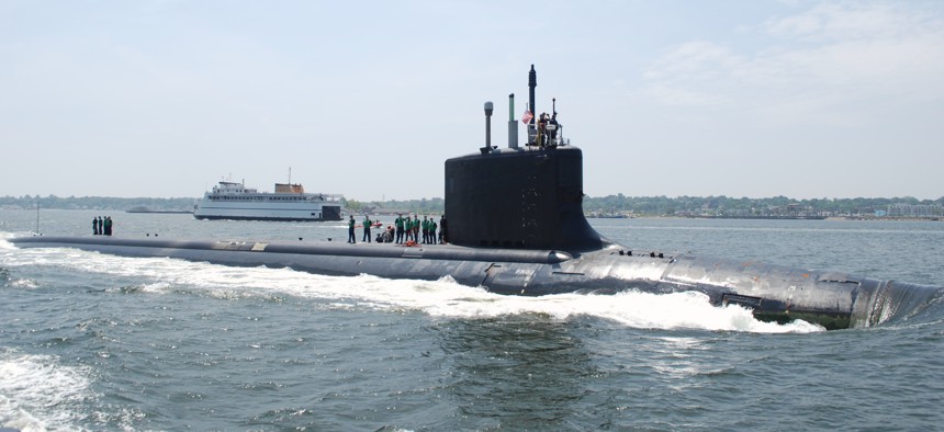 The Virginia-class attack submarine USS New Mexico transits the Thames River to her new home port at Naval Submarine Base New London, Connecticut, in June 2010. 