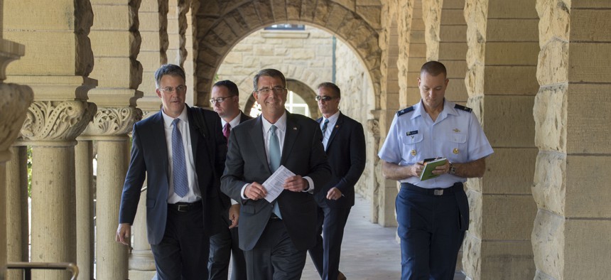Secretary of Defense Ash Carter walks through the Stanford University campus in Palo Alto, Calif., during a visit May 11, 2016. 
