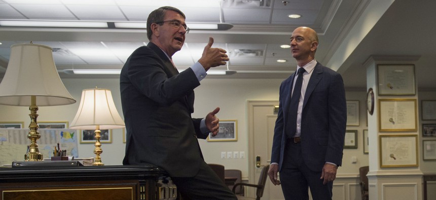Secretary of Defense Ash Carter speaks with Jeff Bezos, Founder, Chairman & CEO of Amazon.com as he arrives at the Pentagon for a visit May 5, 2016. 