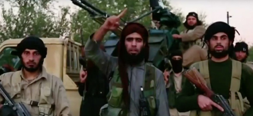 Islamic State fighters appear in a November 2015 video.