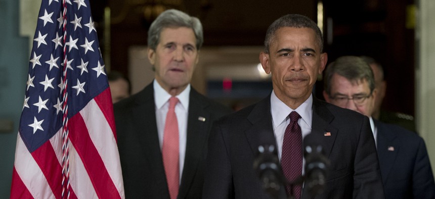 President Barack Obama emerges from a National Security Council meeting at the State Dept., Feb. 2016, with Secretary of State John Kerry, left, Defense Secretary Ash Carter, right, and Joint Chiefs Chairman Gen. Joseph Dunford.