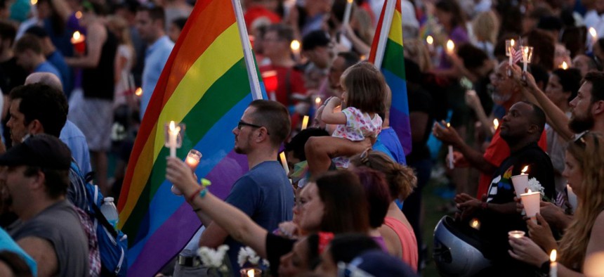 Tens of thousands attend a vigil for the Orlando shooting victims at Lake Eola, Sun., June 19.