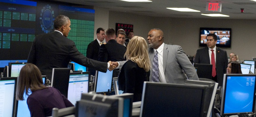 Secretary of Homeland Security Jeh Johnson hosts President Obama at the National Cybersecurity and Communications Integration Center, Jan. 13, 2015.