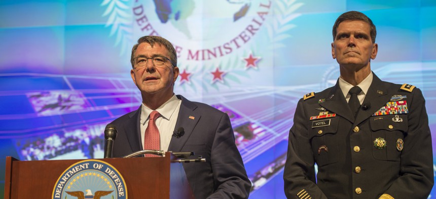 Secretary of Defense Ash Carter and U.S. Army Gen. Joseph Vogel, U.S. Central Command commander, give a press conference during a meeting of defense ministers of the Global Coalition to Counter ISIL July 20, 2016, at Joint Base Andrews, Md. 