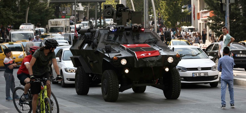 A police APC drives in the city center in Ankara, Turkey, Friday, July 22, 2016.