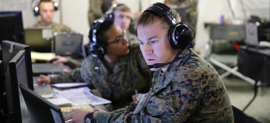 First Lt. Aaron Smith uses a computer during a Marine Air Command and Control System Integrated Exercise at Marine Corps Air Station Cherry Point, N.C., on Feb. 3, 2015.