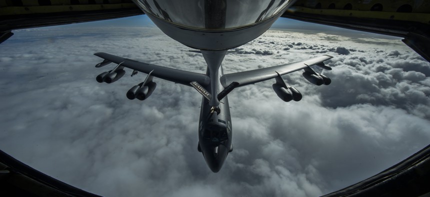 A B-52 Stratofortress is refueled in flight on April 2, 2014 over the Pacific Ocean near Joint Base Pearl Harbor-Hickam, Hawaii. 