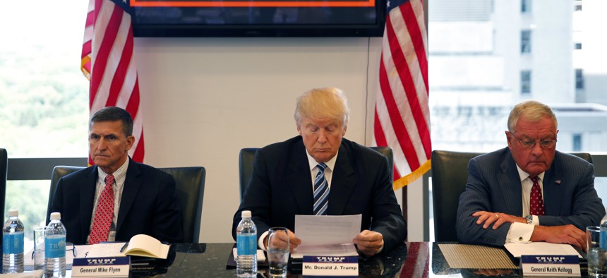 Donald Trump received his first classified intelligence briefing Wednesday. He also held a national security roundtable at Trump Towers with retired Lt. Gen. Mike Flynn, left, and Ret. Army Lt. Gen. Keith Kellogg, right, Wed. Aug. 17, 2016.