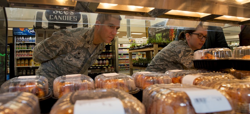 U.S. Airmen conduct a public health inspection at the Travis AFB Commissary, Aug 5, 2016, Travis AFB, Calif.