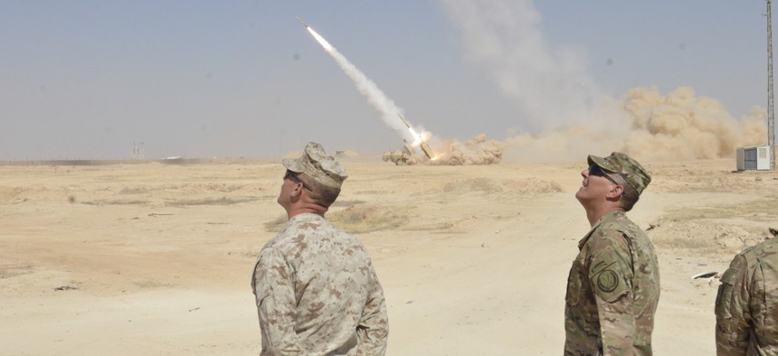 U.S. commanders observe a High Mobility Artillery Rocket System strike that destroyed a building housing Da’esh (an Arabic acronym for ISIL) fighters near Haditha, Iraq, Sept. 7, 2016. 