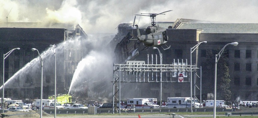 Helicopters land to evacuate casualties from the Pentagon on Sept. 11, 2001. 1 / 3 HIDE CAPTION – Helicopters land to evacuate casualties from the Pentagon on Sept. 11, 2001.