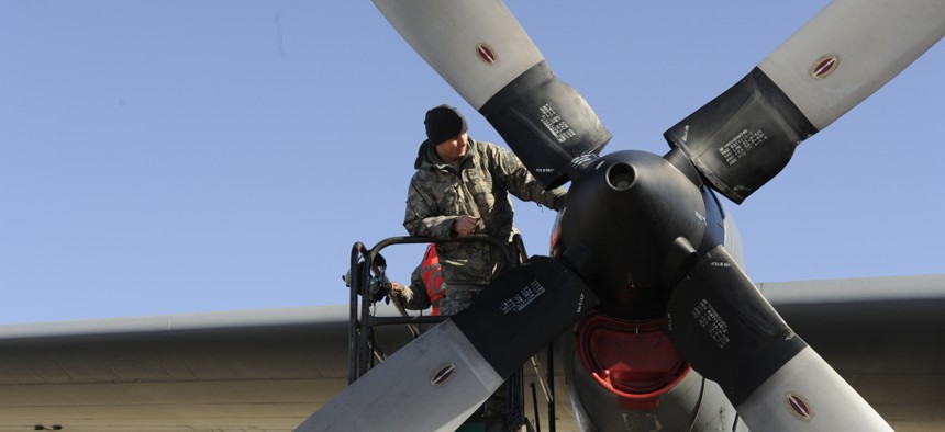 Staff Sgt. Scott Grgurich, a C-130 Hercules aircraft maintainer with the 43rd Aircraft Maintenance Squadron, troubleshoots an engine problem .