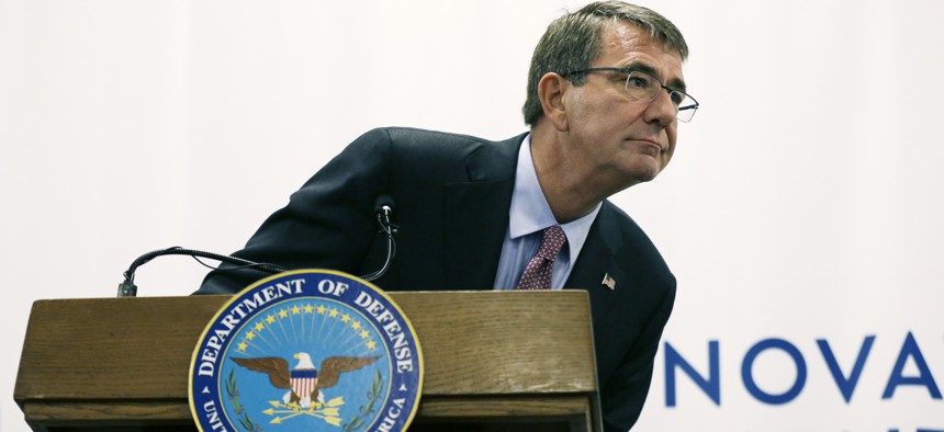 Defense Secretary Ash Carter leans to listen to a reporter's question during a news conference, Tuesday, July 26, 2016, in Cambridge, Mass. Carter appeared in Cambridge to formally open the second office of the Defense Innovation Unit Experimental.