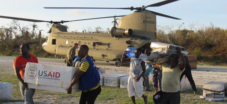 Service members from Joint Task Force Matthew and representatives from the United States Agency of International Development delivered relief supplies to areas afftcted by Hurricane Matthew to Jeremie, Haiti, Oct. 7, 2016.