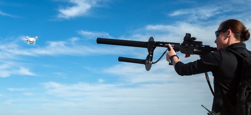 The DroneDefender from Battelle can interupt a drone's control link at 400 meters. 