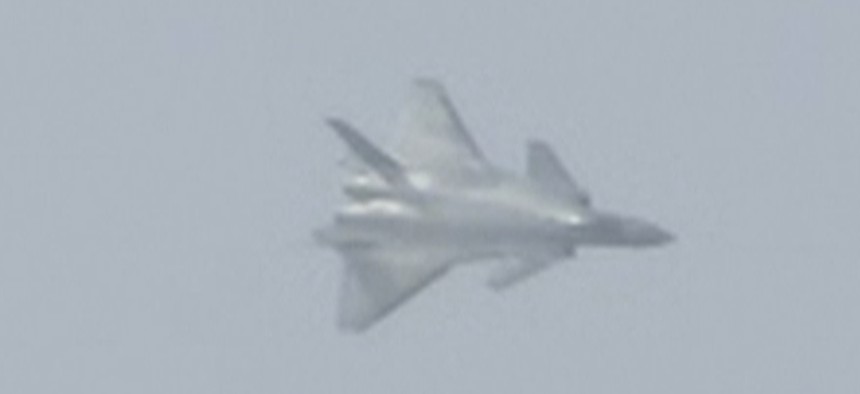 In this image made from video, the J-20 stealth fighter jet flies at the China's International Aviation and Aerospace Exhibition in Zhuhai on Nov. 1, 2016.