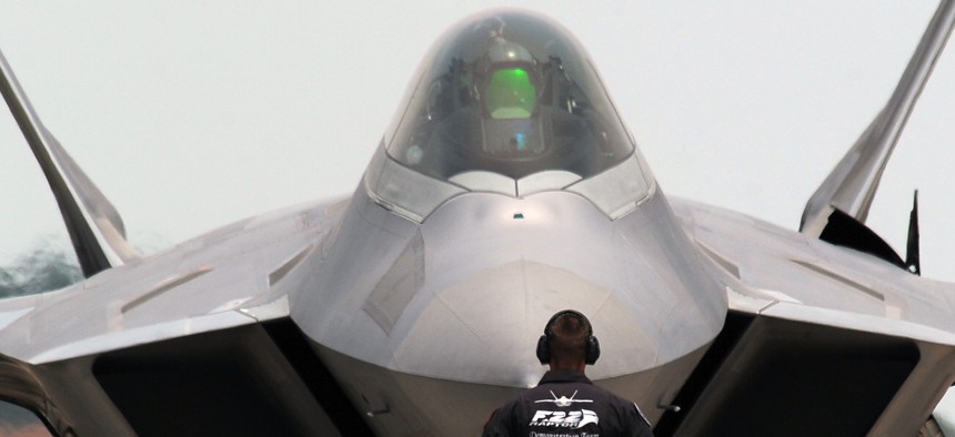 The U.S. Air Force’s F-22 Raptor Demonstration Team prepares to take off from Offutt Air Force Base, Neb., for the 2014 Defenders of Freedom Open House and Air Show July 19, 2014. 