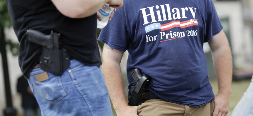 Donald Trump supporters came armed to a rally at Settlers Landing Park on Monday, July 18, 2016, in Cleveland, Ohio.