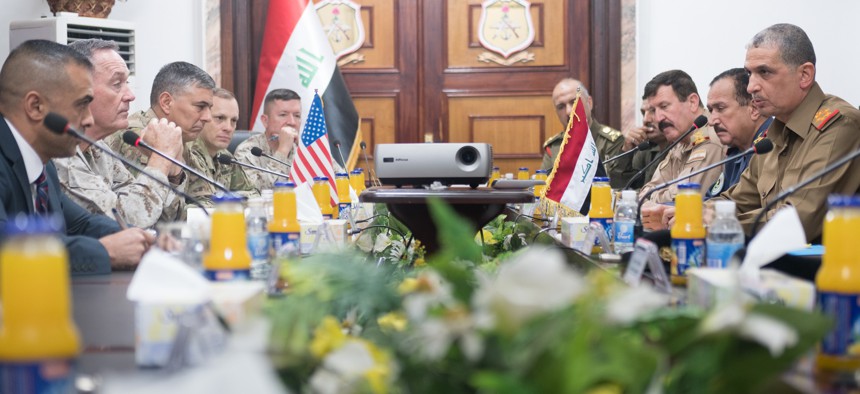 Joint Chiefs Chairman Gen. Joe Dunford, second from left, and Lt. Gen. Stephen Townsend, the top ISIS war commander, meet with Iraqi chief of defense Lt. Gen. Othman al-Ghanimi, in Baghdad, Nov 9, 2016.
