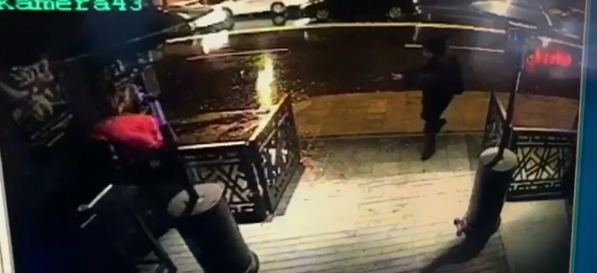 This image taken from CCTV provided by Haberturk Newspaper Sunday Jan. 1, 2017 shows the attacker, armed with a long-barrelled weapon, shooting his way into the Reina nightclub in Istanbul, Turkey on Sunday morning.