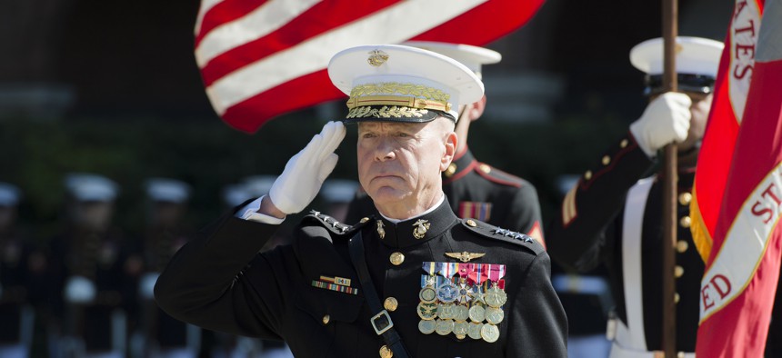 U.S. Marine Corps Gen. James F. Amos, the outgoing commandant of the Marine Corps, salutes during a change of command and retirement ceremony at Marine Barracks Washington in Washington, D.C., Oct. 17, 2014. 
