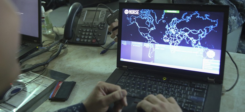 A Marine operates a network monitoring program at Marine Corps Air Station Miramar, Calif., Aug 22, 2016.
