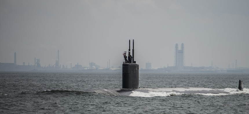 The Los Angeles-class attack submarine USS Columbus (SSN-762) pulls into port at Fleet Activities Yokosuka, May 8, 2014.
