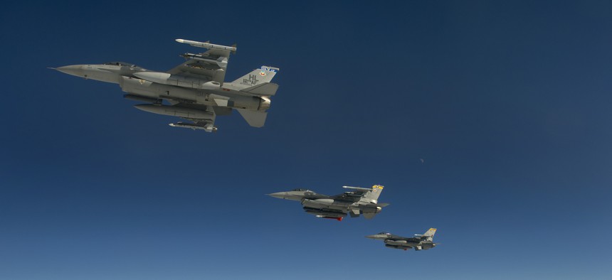 A formation of F-16 Fighting Falcons from the 421st Fighter Squadron, Hill Air Force Base, Utah, depart the snow-laden state en route to San Diego, Calif., Jan. 18, 2013.