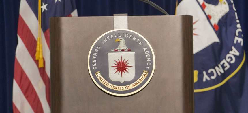 The stage and podium before a press conference at CIA headquarters in Langley, Va., Thursday, Dec. 11, 2014.