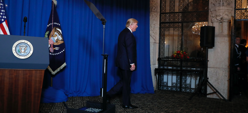 President Donald Trump walks away after speaking at Mar-a-Lago in Palm Beach, Fla., Thursday, April 6, 2017.