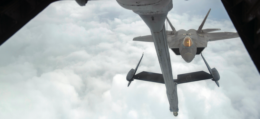 A U.S. Air Force F-22 Raptor approaches a U.S. Air Force KC-10 Extender from the 908th Expeditionary Air Refueling Squadron before aerial refueling during a Combined Joint Task Force - Operation Inherent Resolve mission Feb. 12, 2017. 