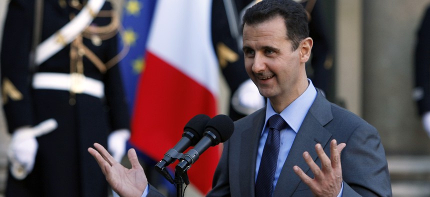 Syria President Bashar al-Assad addresses reporters following his meeting with French President Nicolas Sarkozy at the Elysee Palace in Paris, Thursday Dec. 9, 2010.