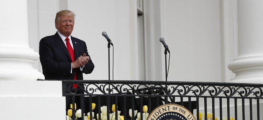 President Donald Trump arrives on the Truman Balcony for the annual White House Easter Egg Roll on the South Lawn of the White House in Washington, Monday, April,17, 2017.