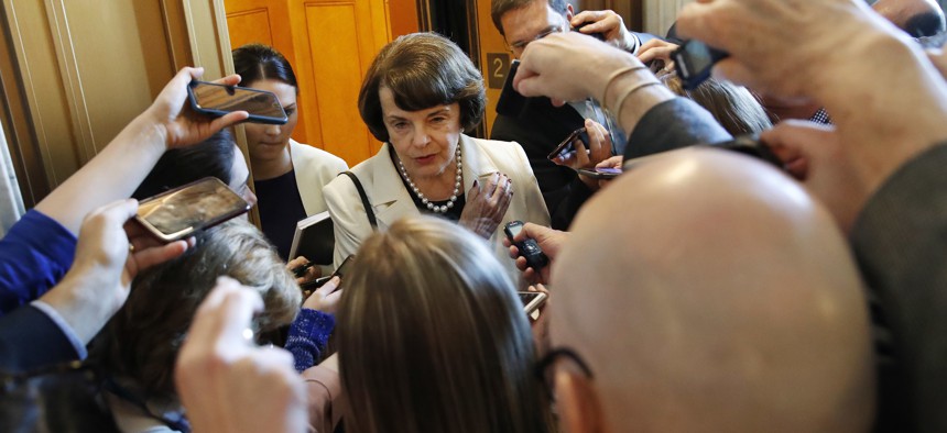 Sen. Dianne Feinstein, D-Calif., ranking member of the Senate Judiciary Committee, is asked questions by reporters about President Trump's decision to fire FBI Director James Comey, on Capitol Hill in Washington, Wednesday, May 10, 2017.