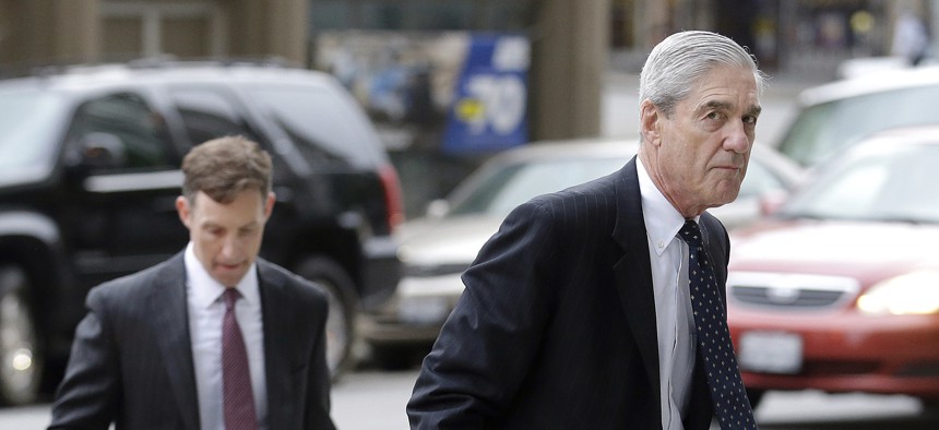 In this 2016 photo, former FBI Director Robert Mueller arrives at a San Francisco courthouse. Mueller was overseeing settlement talks with Volkswagen, the U.S. government and private lawyers for the automaker.