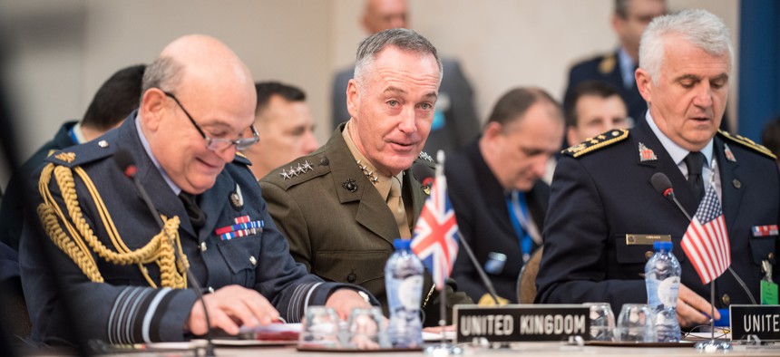 Gen. Joseph Dunford, chairman of the Joint Chiefs of Staff, meets with his counterparts during a NATO Military Committee in Chiefs of Defense session in Brussels.