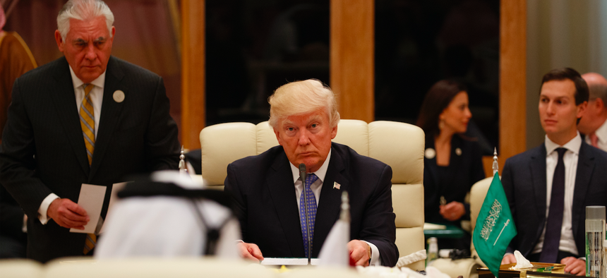 U.S. President Donald Trump participates in a meeting with leaders at the Gulf Cooperation Council Summit, at the King Abdulaziz Conference Center, Sunday, May 21, 2017, in Riyadh, Saudi Arabia. 