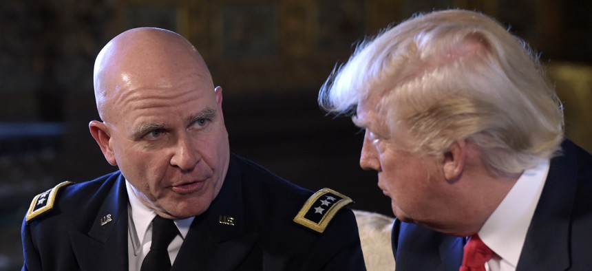 President Donald Trump, right, listens to Army Lt. Gen. H.R. McMaster, left, at Trump's Mar-a-Lago estate in Palm Beach, Fla., Monday, Feb. 20, 2017.