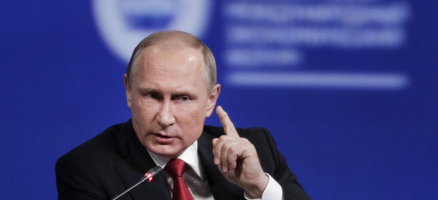n this Friday, June 2, 2017, file photo, Russian President Vladimir Putin gestures as he speaks at the St. Petersburg International Economic Forum in St. Petersburg, Russia. 